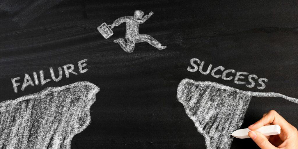 chalk drawing of avoiding failure for a successful outcome